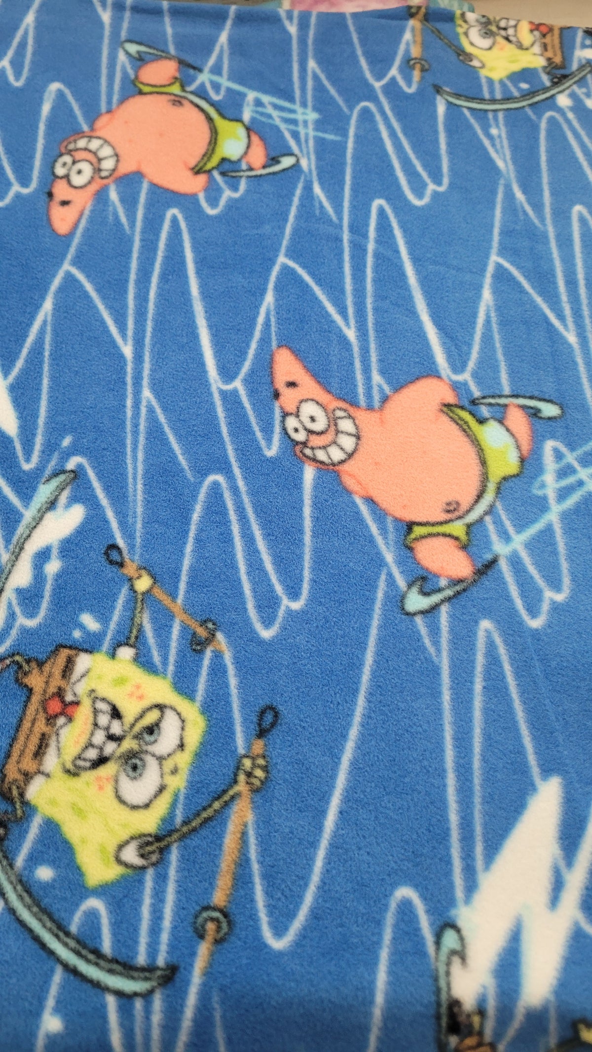 Sponge Bob and Patrick Winter Sports Fleece sold by the Half Yard
