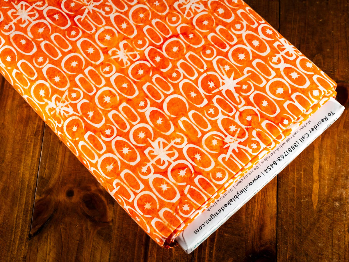 Batiks Starburst Groove Tangerine BT23571­-235  Riley Blake Half Yard