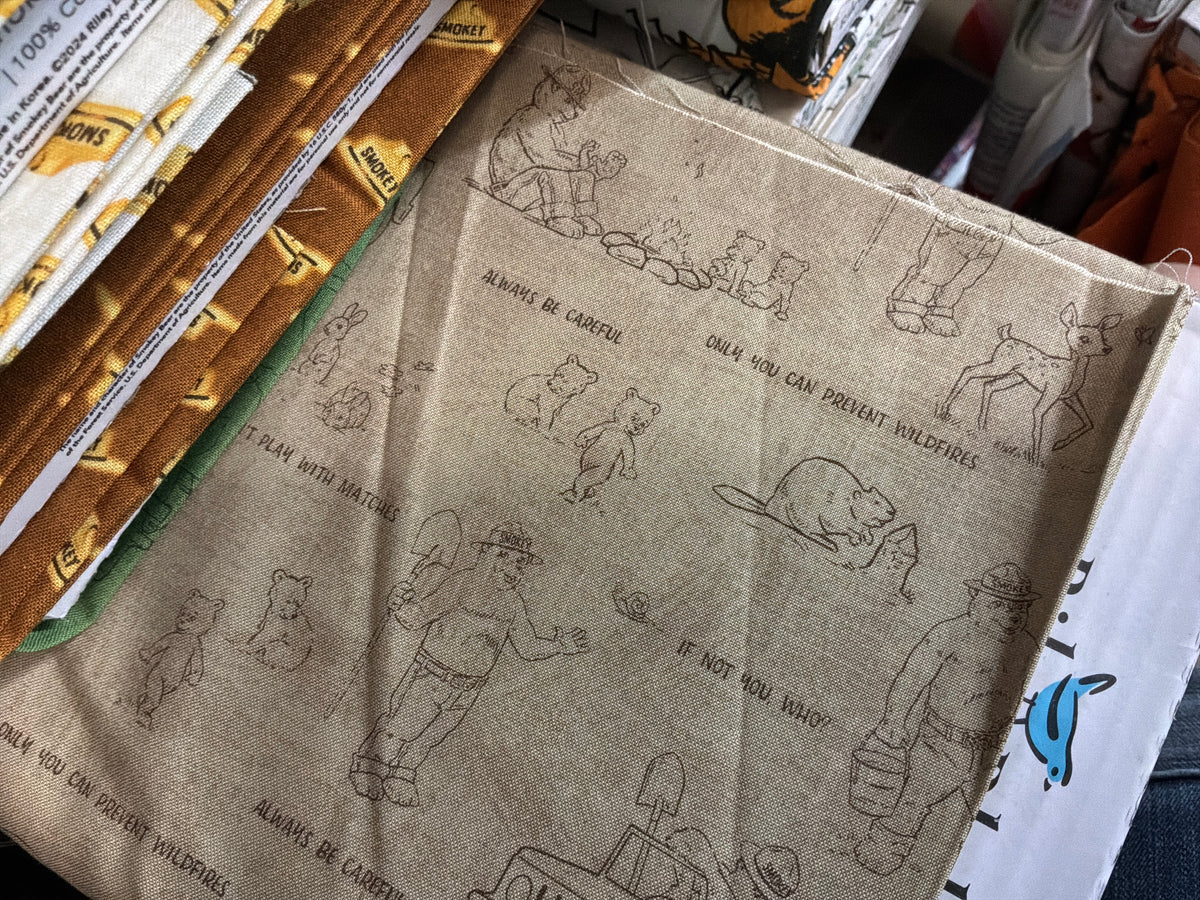 OUTLINES SAND FRIENDS OF SMOKEY BEAR RBD COLLECTION RILEY BLAKE DESIGNS C16504R-SAND HALF YARD