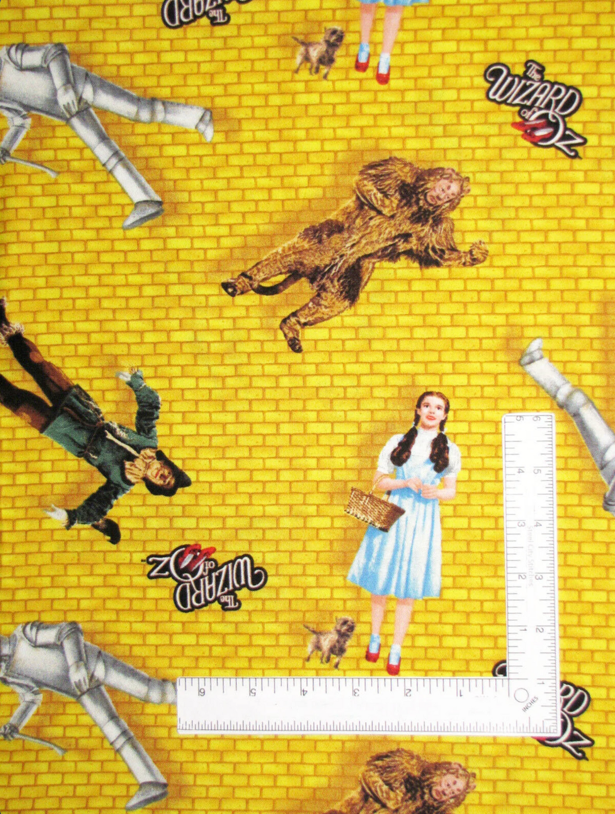 Wizard of Oz Characters Tossed on Yellow Brick Road Quilting Treasures Half Yard